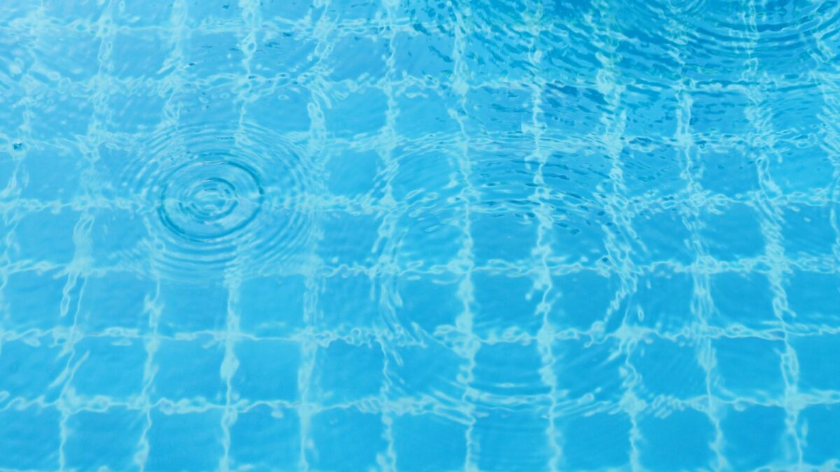 Rain drops on the swimming pool.